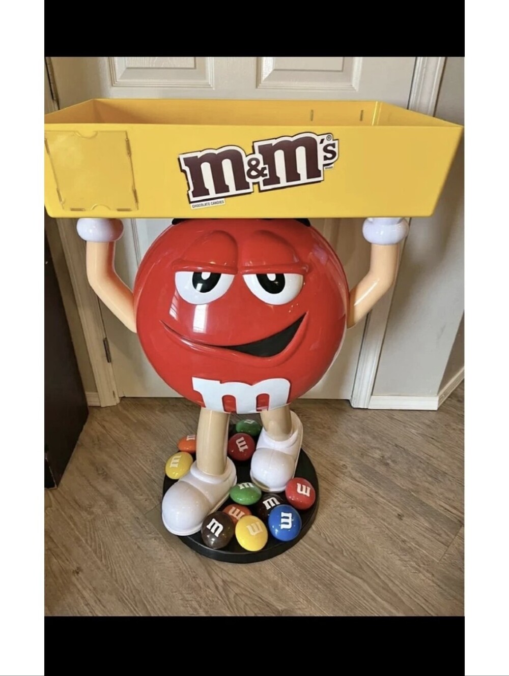 M&M'S Red Character Display with Yellow Tray and Multicolor Candy Base